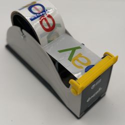 Tape Dispenser And Tape