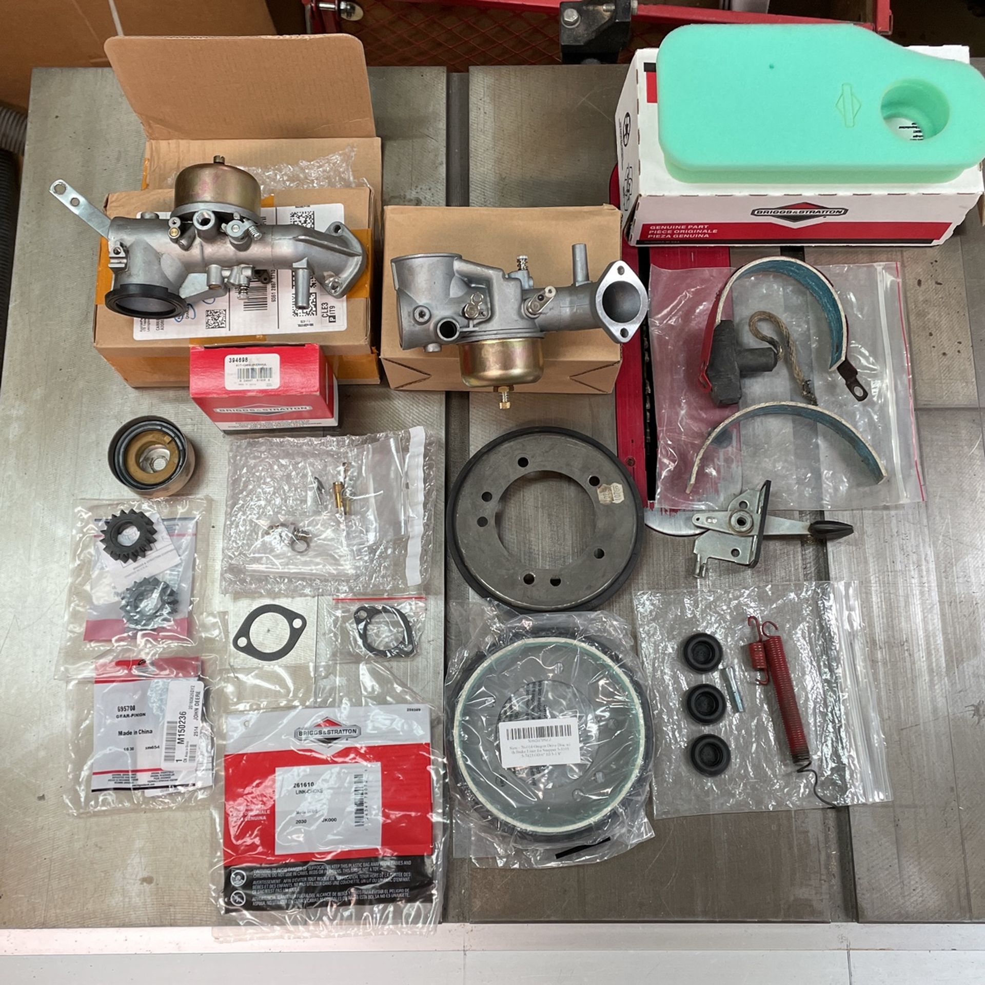 ASSORT PARTS & MANUALS FOR B&S AND SNAPPER RIDING MOWER