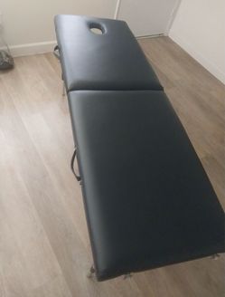 Massage table