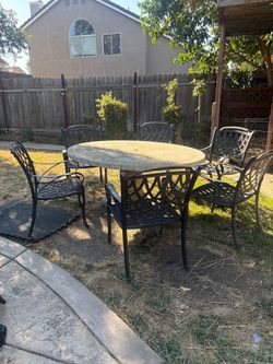 7 piece slate cement mosaic table with 6 aluminum chairs and cushions