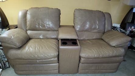 Three person Couch Recliner  and Two person couch love seat recliner and rocker.