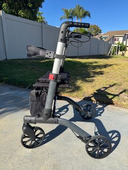 Wheeled folding walking aid