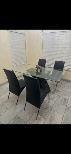 Dining table and 4 chairs $250 OBO