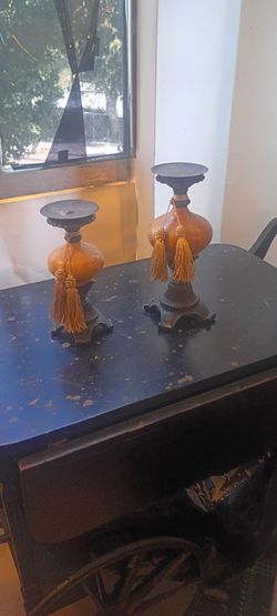 A nice looking pair of candle holders