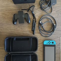 Like New Nintendo Switch (original version) with all original accessories and carrying case