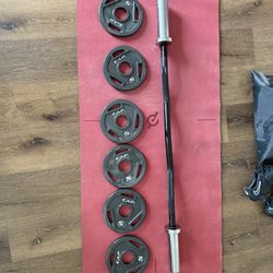 Olympic EZ Curl bar with weights 