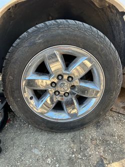Chevy // GMC 20” Stock wheels 275/55/20  All Terrain Tires