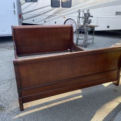Solid, heavy wood bedframe, California king