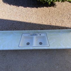 Countertop with sink and faucet