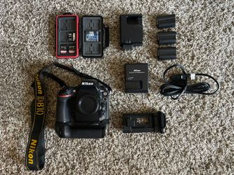 Nikon D810 with handgrip, media, and batteries