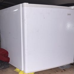 Sanyo compact vertical freezer.  