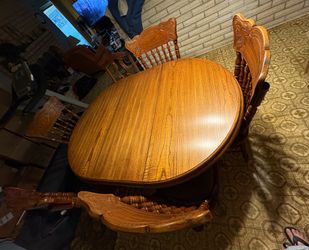 Moving sell, wooden table with six chairs & one leaf