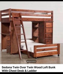 Twin bed over twin wood loft bunk with chest desk, closet, and drawers