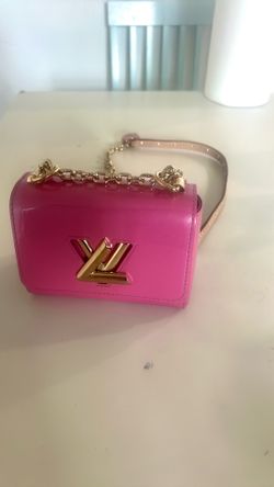 Limited edition Pink Louis Vuitton with gold hardware and charm