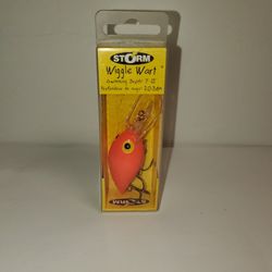 STORM WIGGLE WART FLORESCENT RED WW05 448