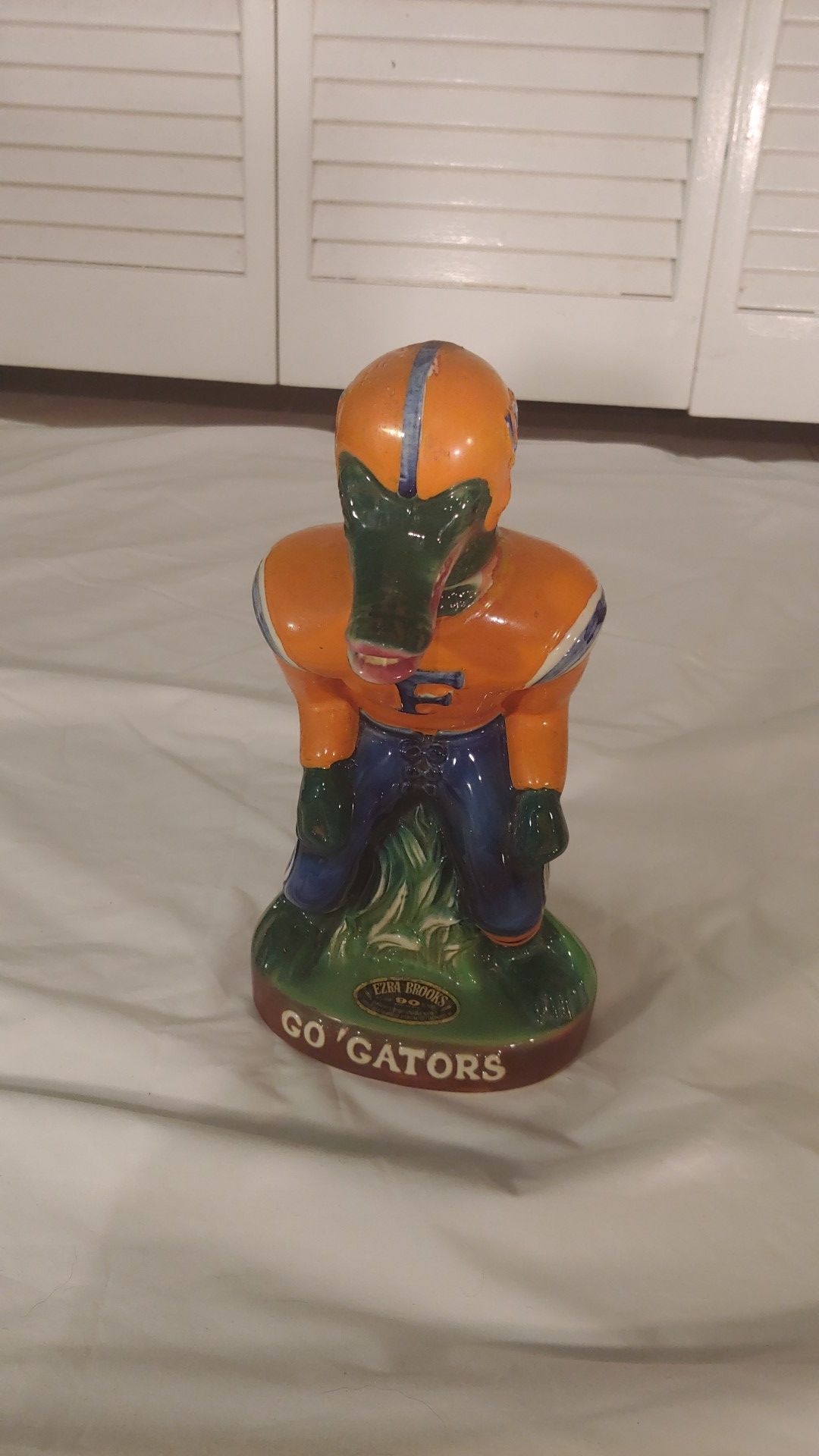 1975 Florida gators liquor decanter (empty) from the Ezra Brooks distillery of a lineman #55. The 1975 linemen were super rare.