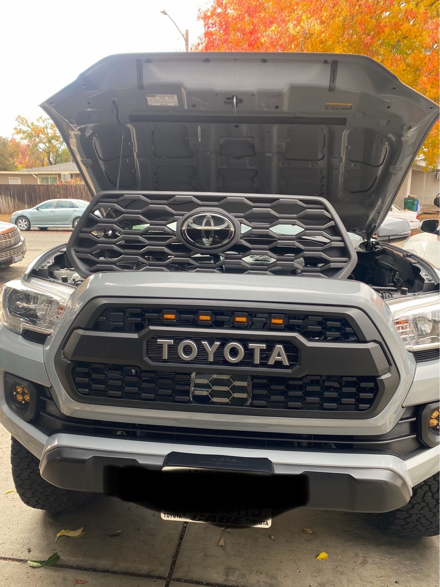Brand new Tacoma TRD grill with raptor lights harness