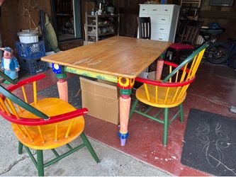 Hand painted wooden kitchen table with two matching chairs