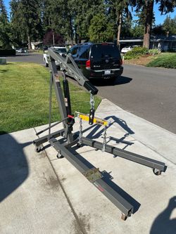 1 ton Engine hoist with leveler -$200