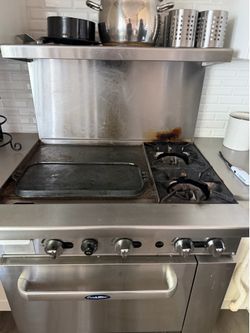 Commercial range two burners and a griddle 36