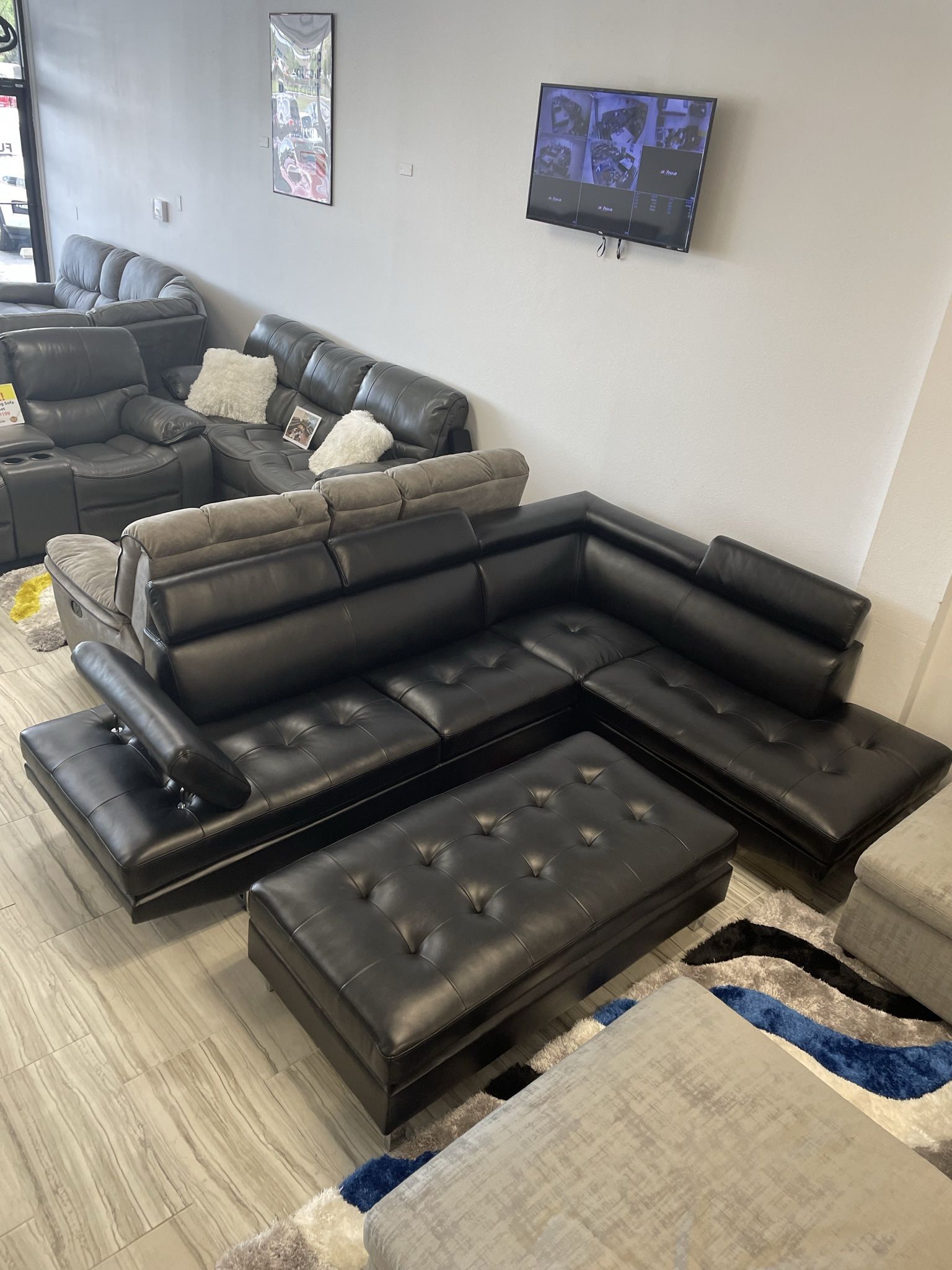 Tax Time Sale Going On Now. Ibiza Black Leather Sectional With Ottoman Now $699. Easy Finance Option. Same-Day Delivery.