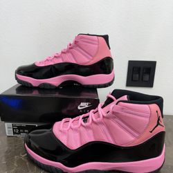 New! Unworn! Air Jordan 11 retro pink and black men’s size 12