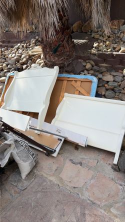Bed frame and 2 mattresses.