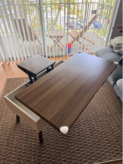 Coffee Table - Lifts and extends