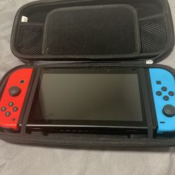 Nintendo switch and 7 games pro controller carrying case cords and tv base