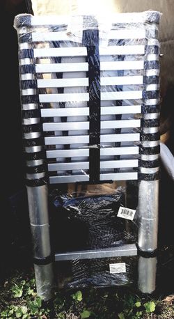 12 1/2 ft telescoping ladder new in package