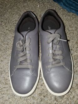 Cole Haan Grand Crosscourt Traveler men's sneakers in a grey leather finish