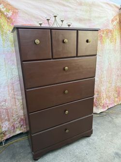 Modern style/barn wooden dresser with plenty space for clothes colors konan brown and antique gold has been refurbished