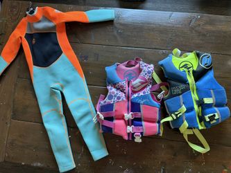 Kids Wetsuit And Life Jackets