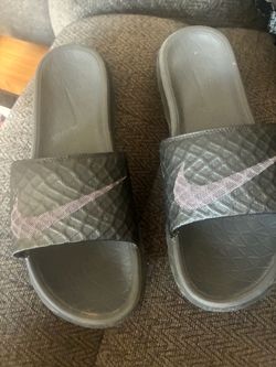 Women’s size 9 like new black &purplish Nike slides $15
