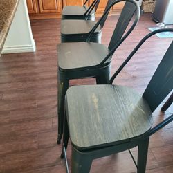 Four rotating counter stool chairs