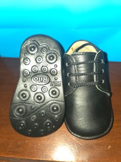 Black leather baby shoes