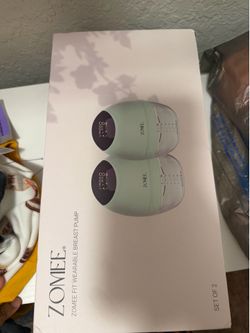 Wearable breast pump