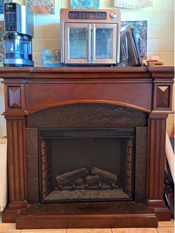 Large wood, electric fireplace mantle, surround traditional style