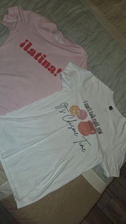 Bag full of small size t shirts, blouses, sports bras, pajama pants, pants and shorts