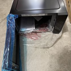 GE Profile 2.2 cu. ft. 1100-Watt Countertop Microwave in Black with Built-In Sensor