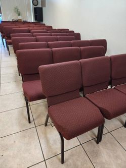 Large burgundy upholstered chairs