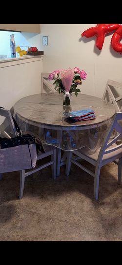 wood circle table and 4 chairs