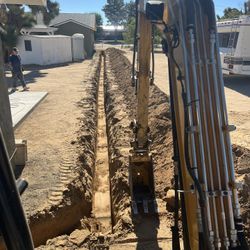Mini Excavator  & Bobcat 