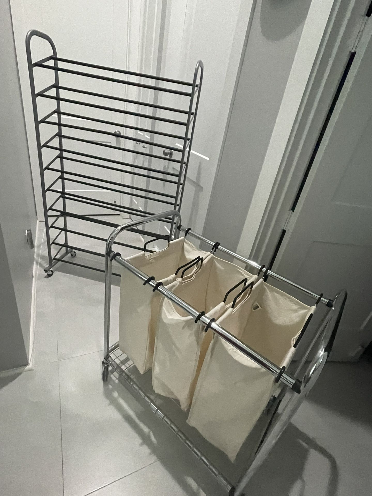 Tall shoe rack and 3 laundry Shoots. $25 Each. Pick Up In Jupiter.