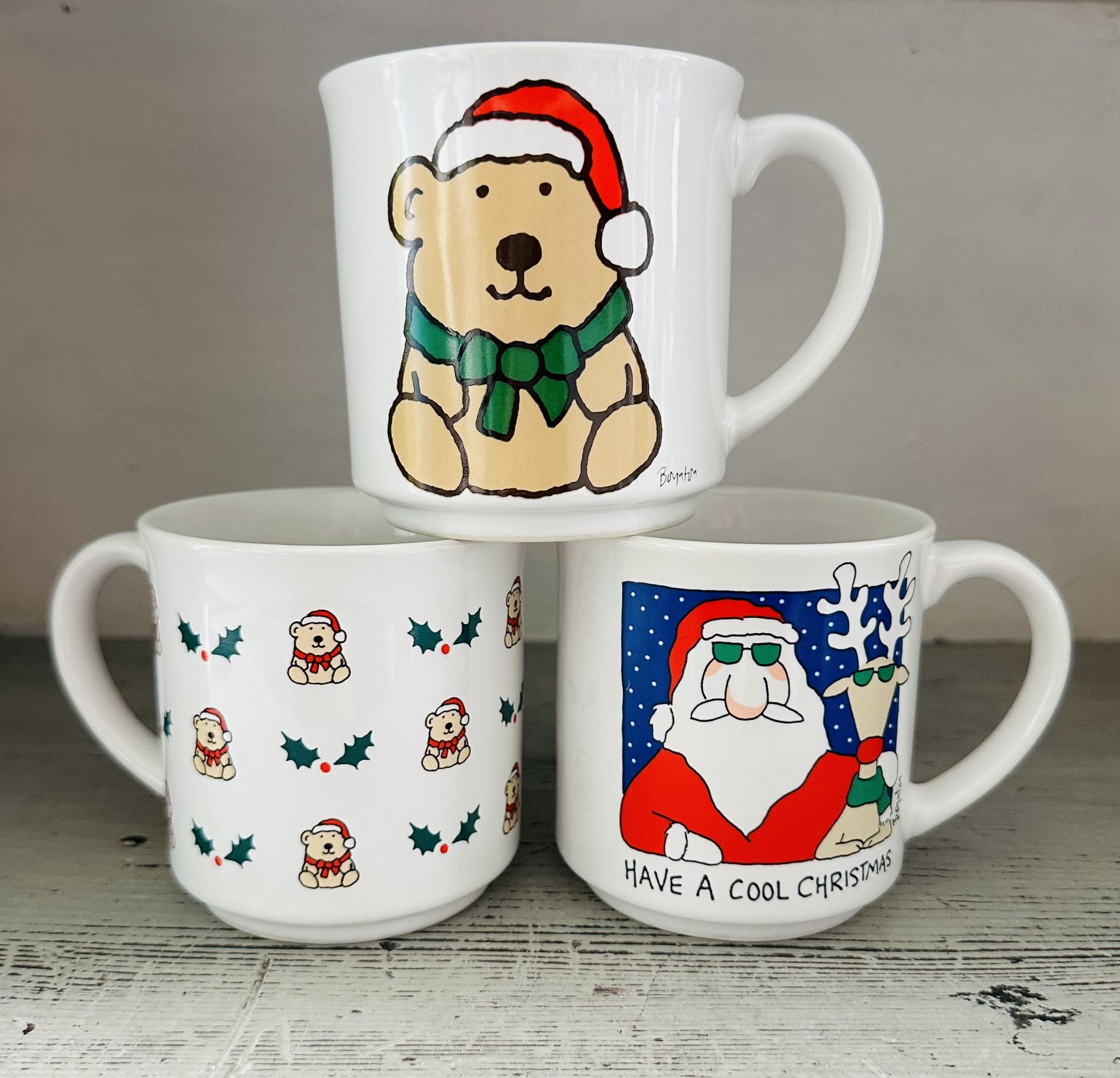 3 Vintage Boynton christmas mugs 12 oz size. One has Cool Santa and two have Christmas bears.