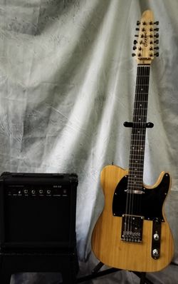 Brand new electric guitar and new 20 watts amp