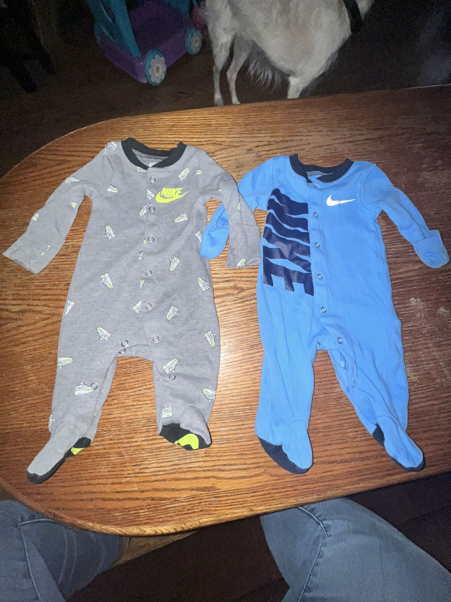 Pair Of Newborn Size Nike Footed Onesies