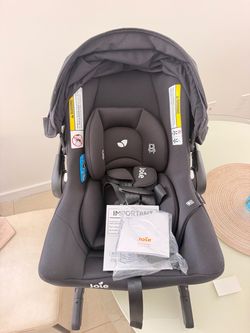 “Joie Ginger TS Infant Car Seat — Brand New, Never Used”.