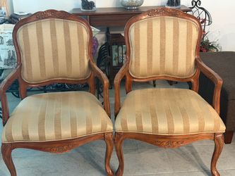 Pair of French Provincial Carved Wood Armchairs