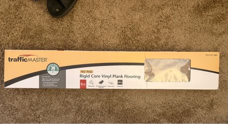 Sealed snap together LVT tiles